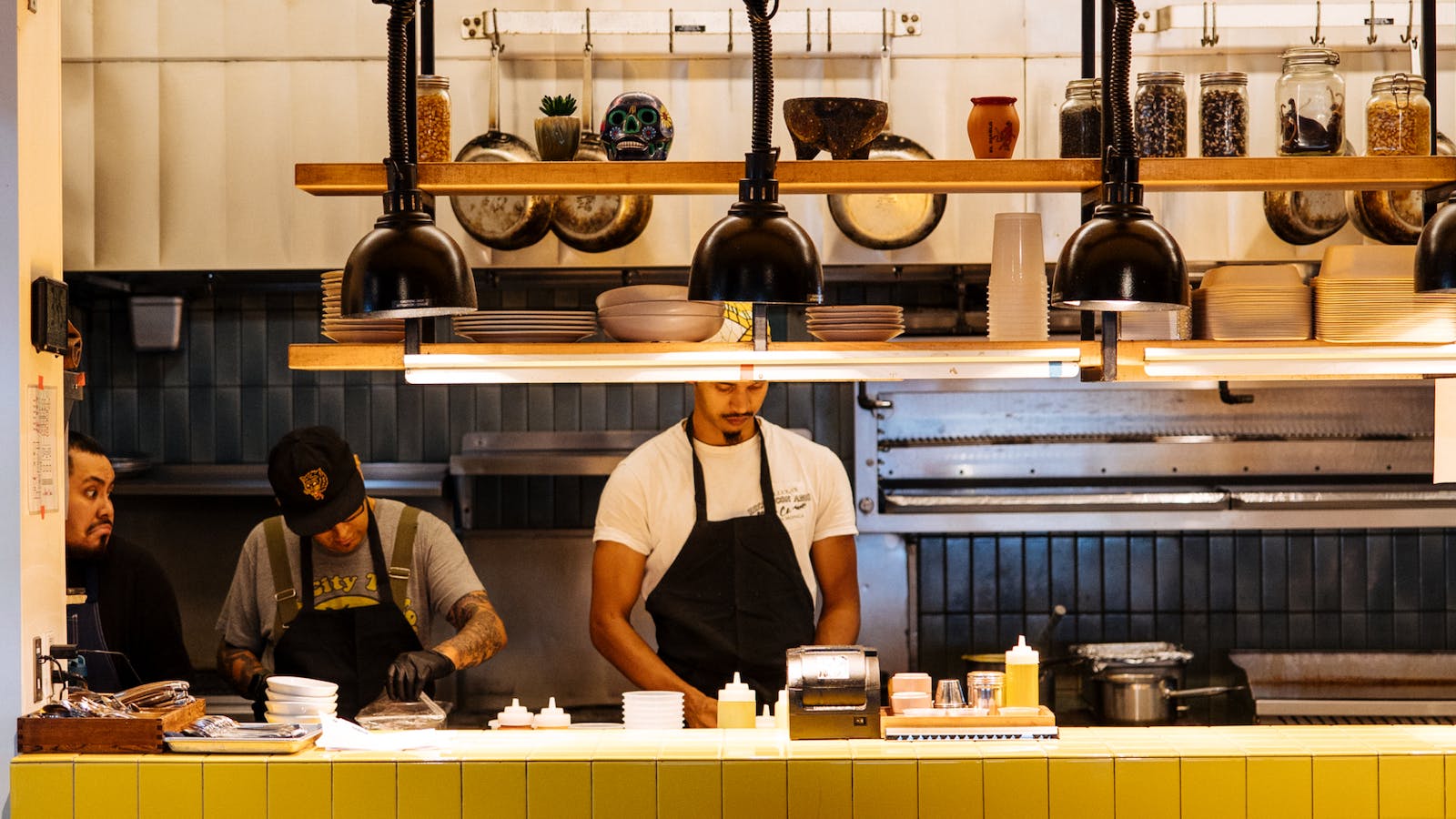 Kitchen staff working at a restaurant.