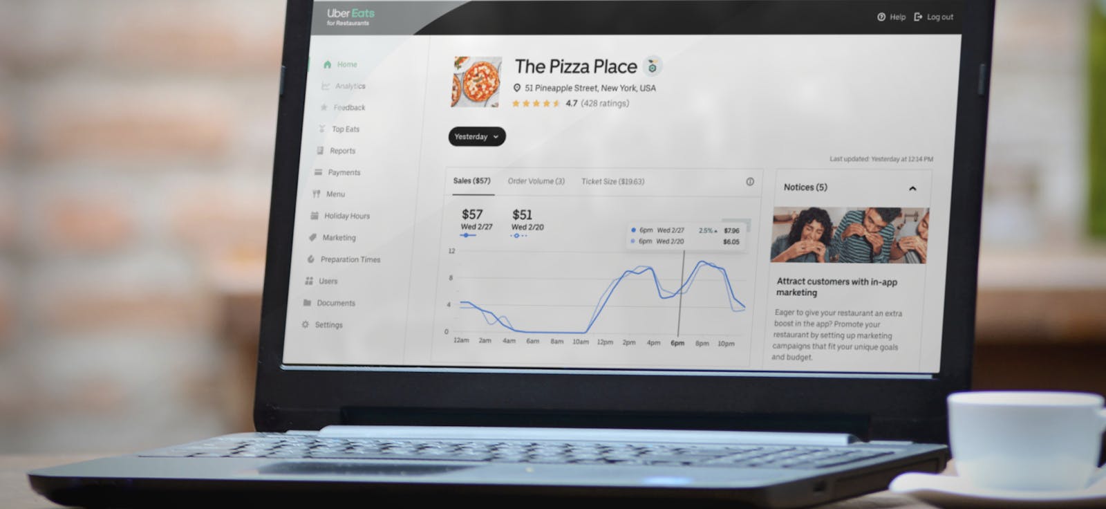 Image of Uber Eats Merchant Portal open on a laptop